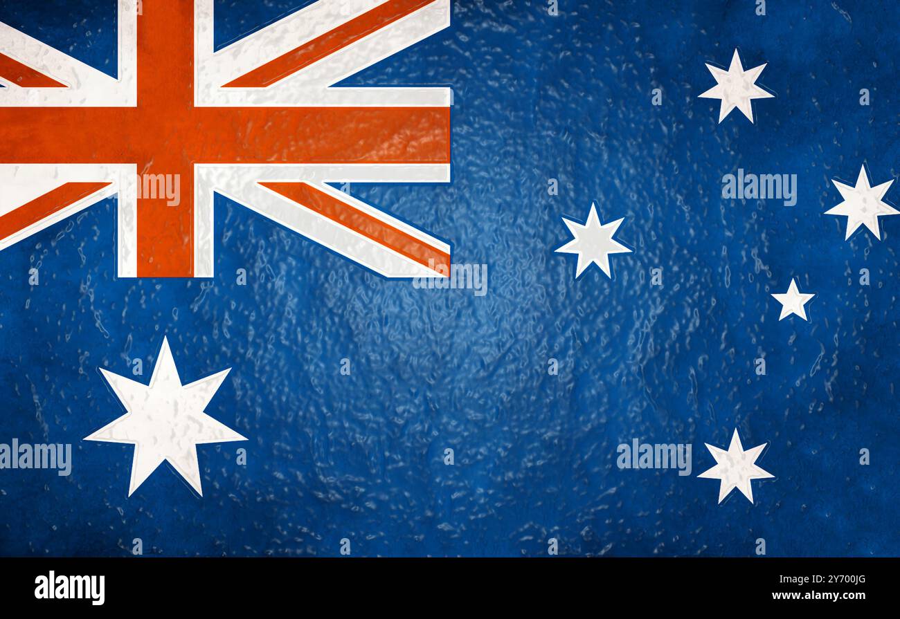 Die australische Flagge ist wunderschön auf einem reich strukturierten blauen Hintergrund abgebildet und zeigt den Stolz der Nationen Stockfoto