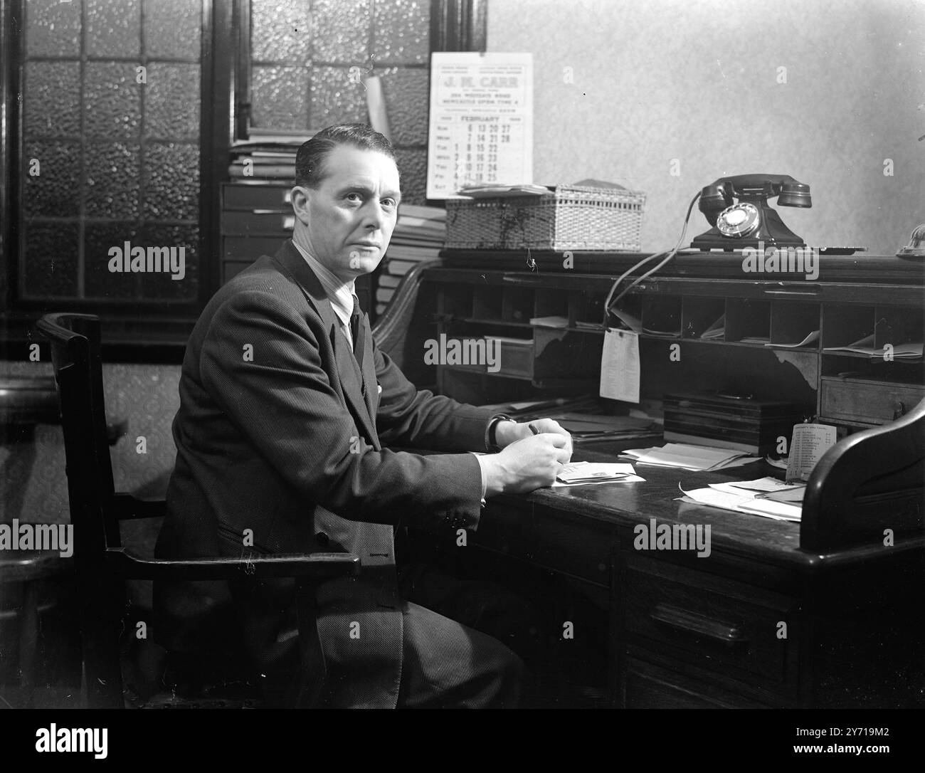 MANAGER VON NEWCASTLE UNITED . Herr . George Martin , Manager von Newcastle an seinem Schreibtisch . 8. März 1949 Stockfoto