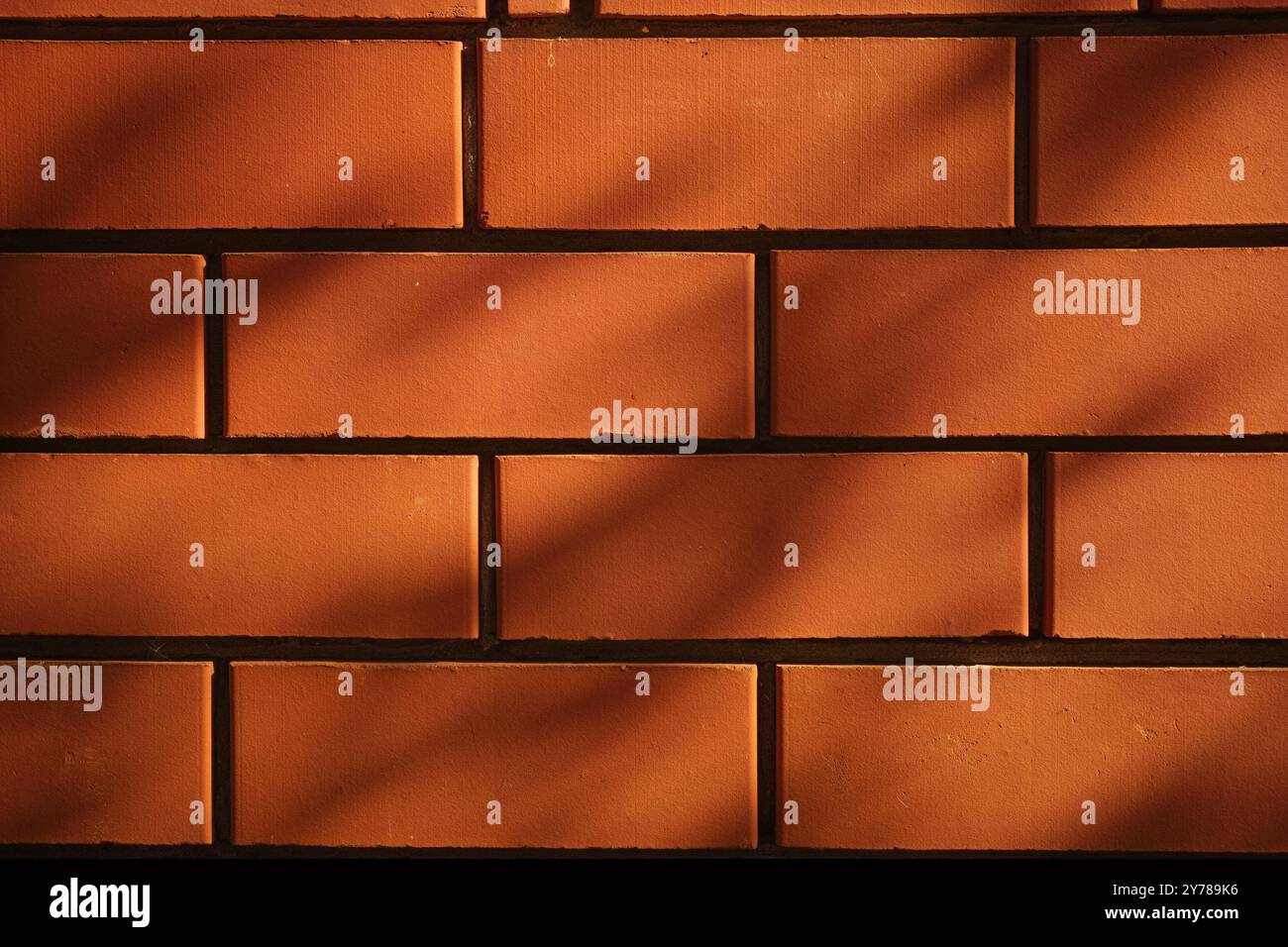 Ein roter Backsteinwand Hintergrund. Nahaufnahme. Stockfoto