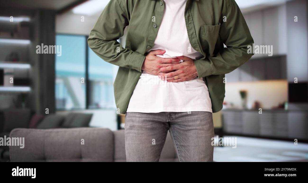 Zöliakie Und Gluten-Intoleranz. Mann Mit Bauchschmerzen Stockfoto