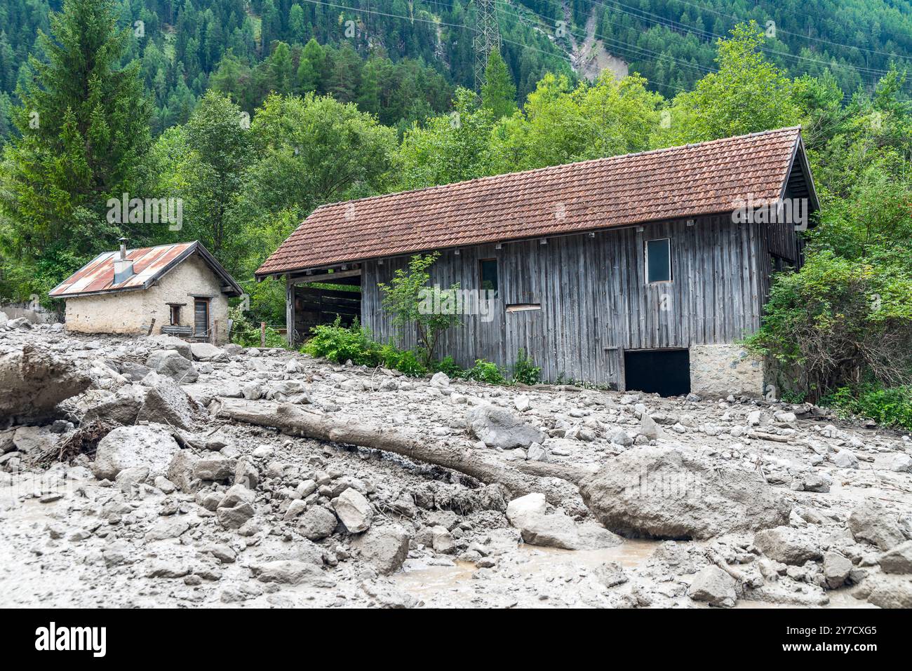 Trümmerfluss, natürliche Gefahr von einem Nebenfluss des Inn River, Engadine, Schweiz Stockfoto