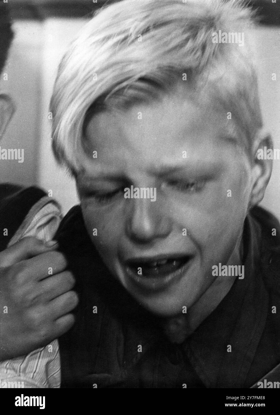 Ein Kind in einer Sprechklinik in Stockton on Tees, die sich auf die Therapie des Stammerns spezialisiert hat. 1951. Stockfoto