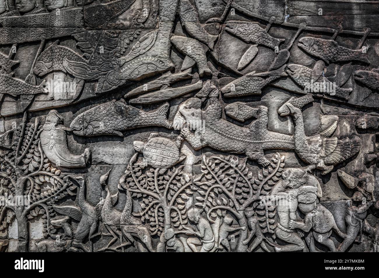 Komplizierte Steinmauerschnitzereien in Bayon, Angkor Thom, Kambodscha Stockfoto