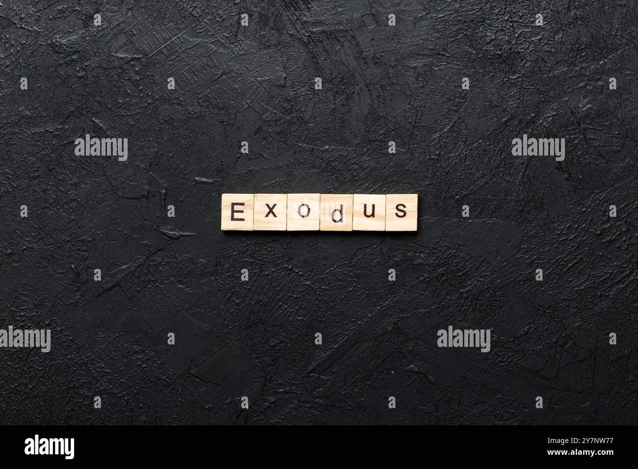 Exodus Wort auf Holz Block geschrieben. Exodus text auf Tisch, Konzept. Stockfoto
