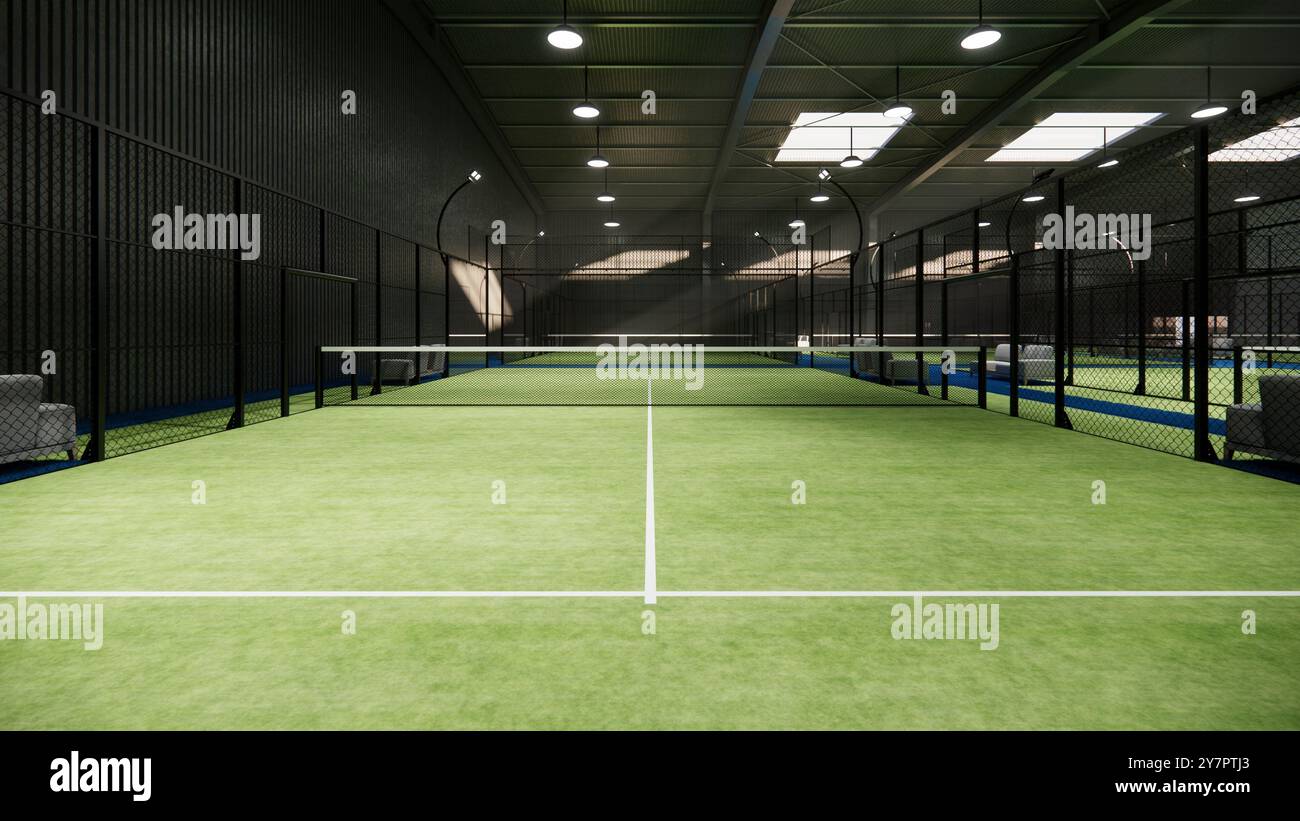 Eine grüne Padel-Tennisplätze, Sporteinrichtungen im Hangar-Gebäude Stockfoto