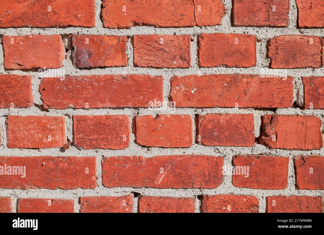 Nahaufnahme einer alten roten Backsteinmauer. Stockfoto