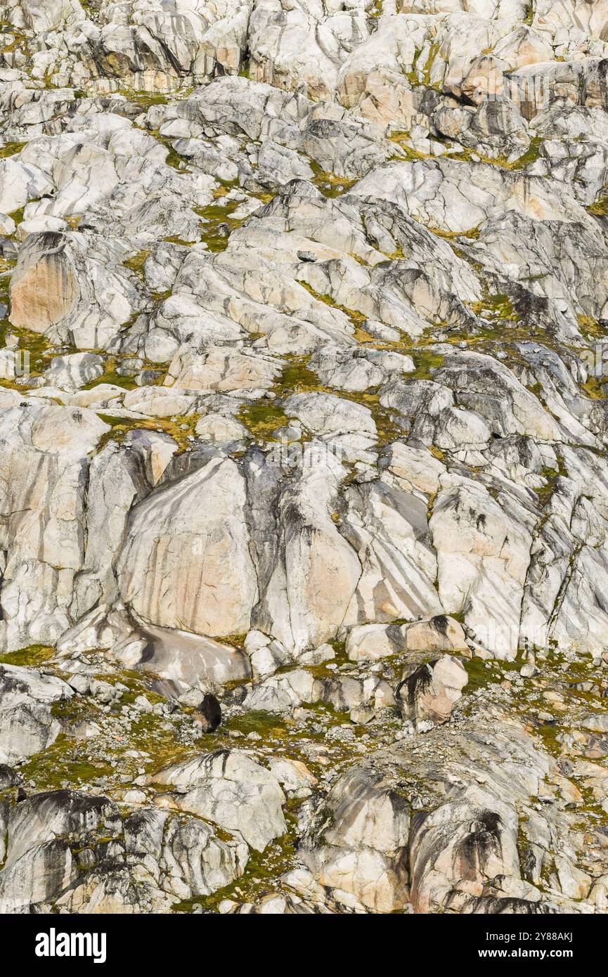 Abstraktes Muster auf der Felswände aus Granit an der Seite eines Fjords im Prince Christian Sound in Grönland Stockfoto