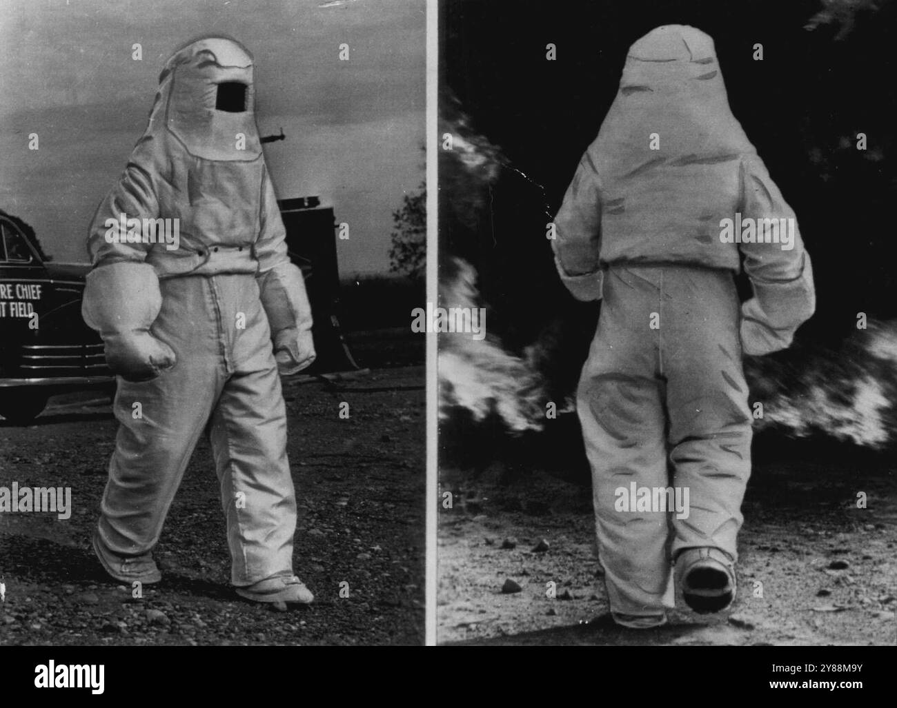 Neuer Anzug hält Feuerwehrmann kühl in Inferno -- Freiwilliger Feuerwehrmann Clarence V. Wallace erscheint (links) im neuen Schutzanzug der Air Force, der entwickelt wurde, um Feuerwehrleute und Rettungskräfte bei Flugzeugabstürmen zu schützen. Auf der rechten Seite geht Wallace in Richtung brennendes Öl und Benzin in einem Test auf dem Luftwaffenstützpunkt Wright-Patterson in Dayton, Ohio. Der Anzug besteht aus 18 Lagen verschiedener Glasfasern und Silber- und Aluminiumfolie. November 1949. (Foto von AP Wirephoto). Stockfoto