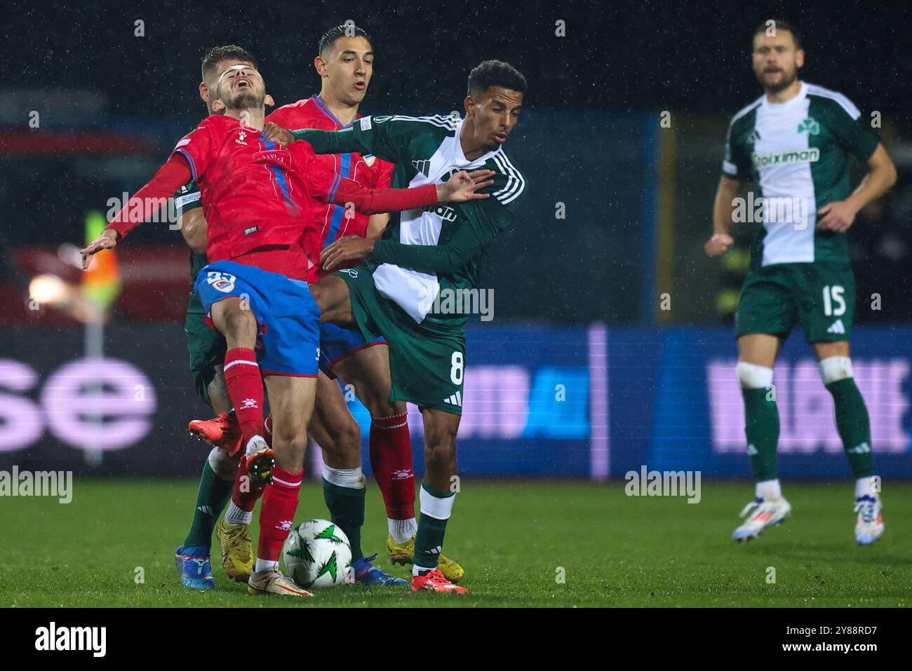 Borac's David Cavic, left, and Panathinaikos' Azzedine Ounahi fight for the ball during the Europa Conference League opening phase soccer match between Borac and Panathinaikos in Banja Luka, Bosnia, Thursday, Oct. 3, 2024. (AP Photo/Armin Durgut) Stockfoto
