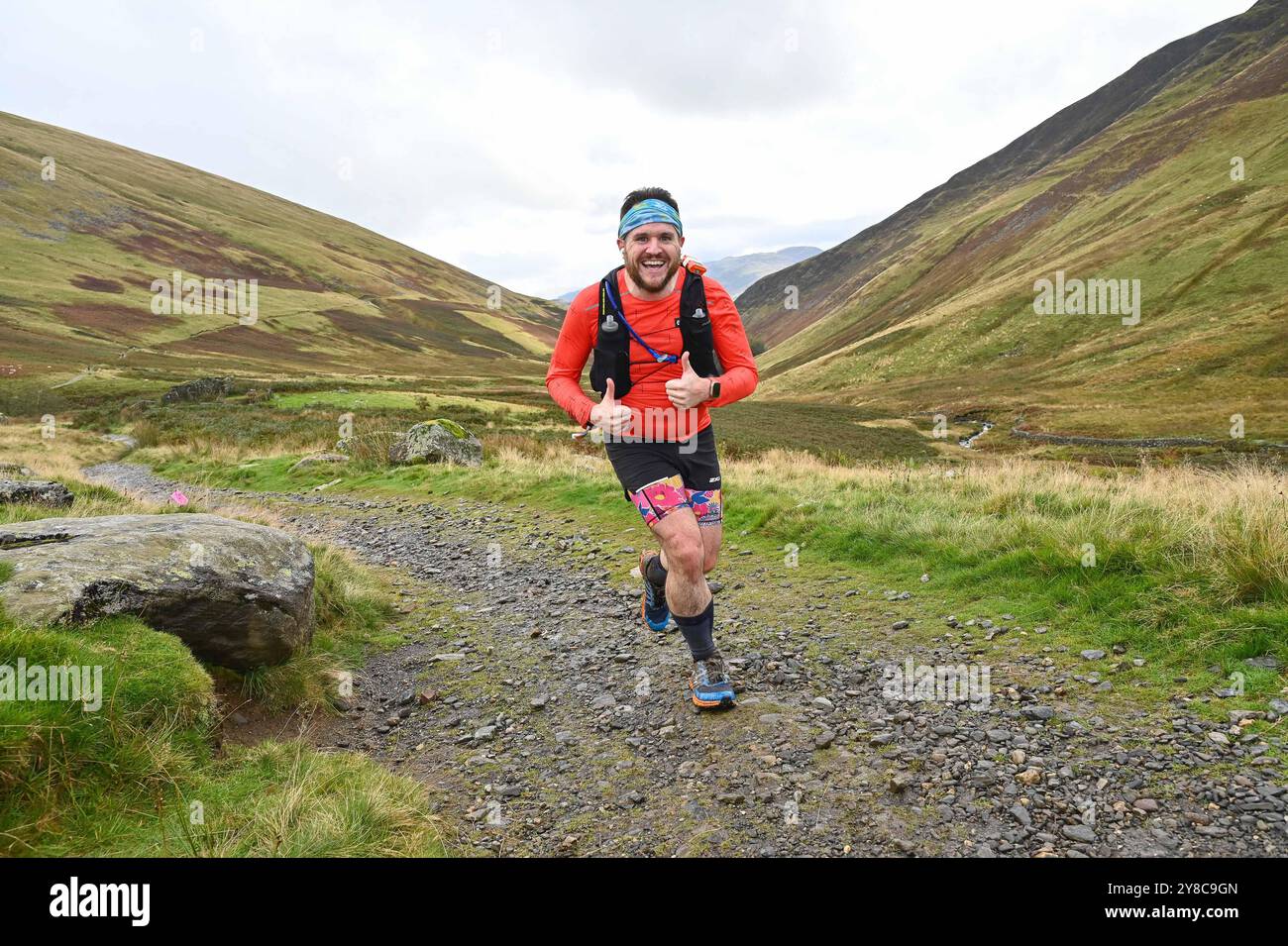 Trailläufer, die an 13 Valleys Ultra Marathon, Lake District, Cumbria, Großbritannien teilnehmen Stockfoto