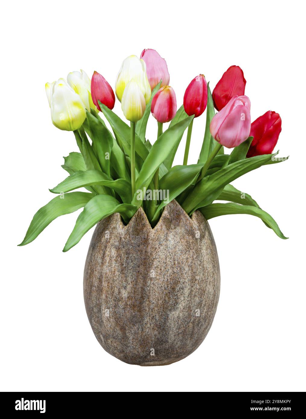 Frühlingsdeco mit künstlichen Tulpen isoliert auf weiß in einer Vase Stockfoto