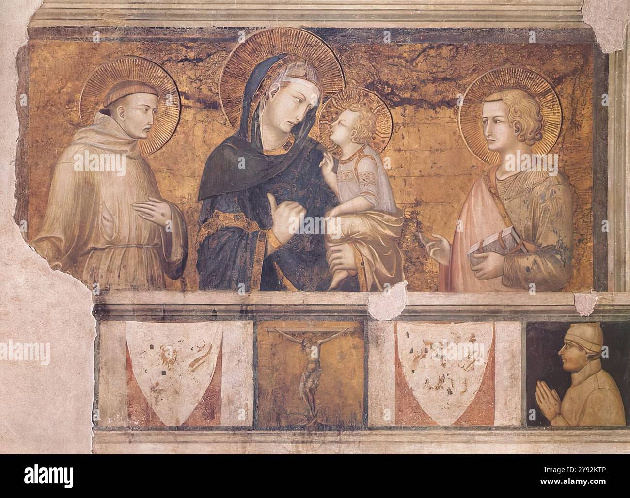 LORENZETTI, Pietro (* ca. 1280, Siena, d. 1348, Siena) Madonna mit dem hl. Franz und dem hl. Johannes dem Evangelisten 1320-25 Fresco Lower Church, San Francesco, Assisi dieses lyrische Bild, das sich im linken Querschiff befindet, ist eines der frühesten Beispiele der Santa Conversazione. Unten, auf der schmalen Predella, ist das Kruzifix mit goldenem Hintergrund zwischen dem Wappen der Orsini-Familie zu sehen. Auf der rechten Seite befindet sich das Profilporträt des Spenders. --- Schlüsselwörter: ----------------- Autor: LORENZETTI, Pietro Titel: Madonna mit dem hl. Franziskus und dem hl. Johannes dem Evangelisten Zeitlinie: 1301-1350 Schule: Stockfoto