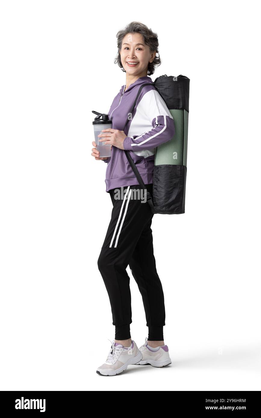 Glückliche Seniorin, die Sport macht Stockfoto