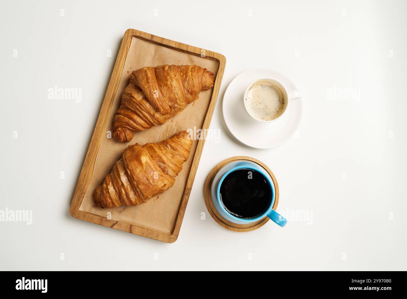 Croissant egg muffin coffee salad isolated white background Stockfoto