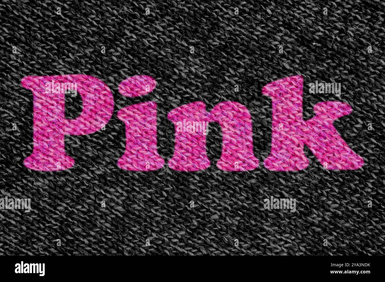 The Word Pink On Black Wool In Pink Die Stockfoto