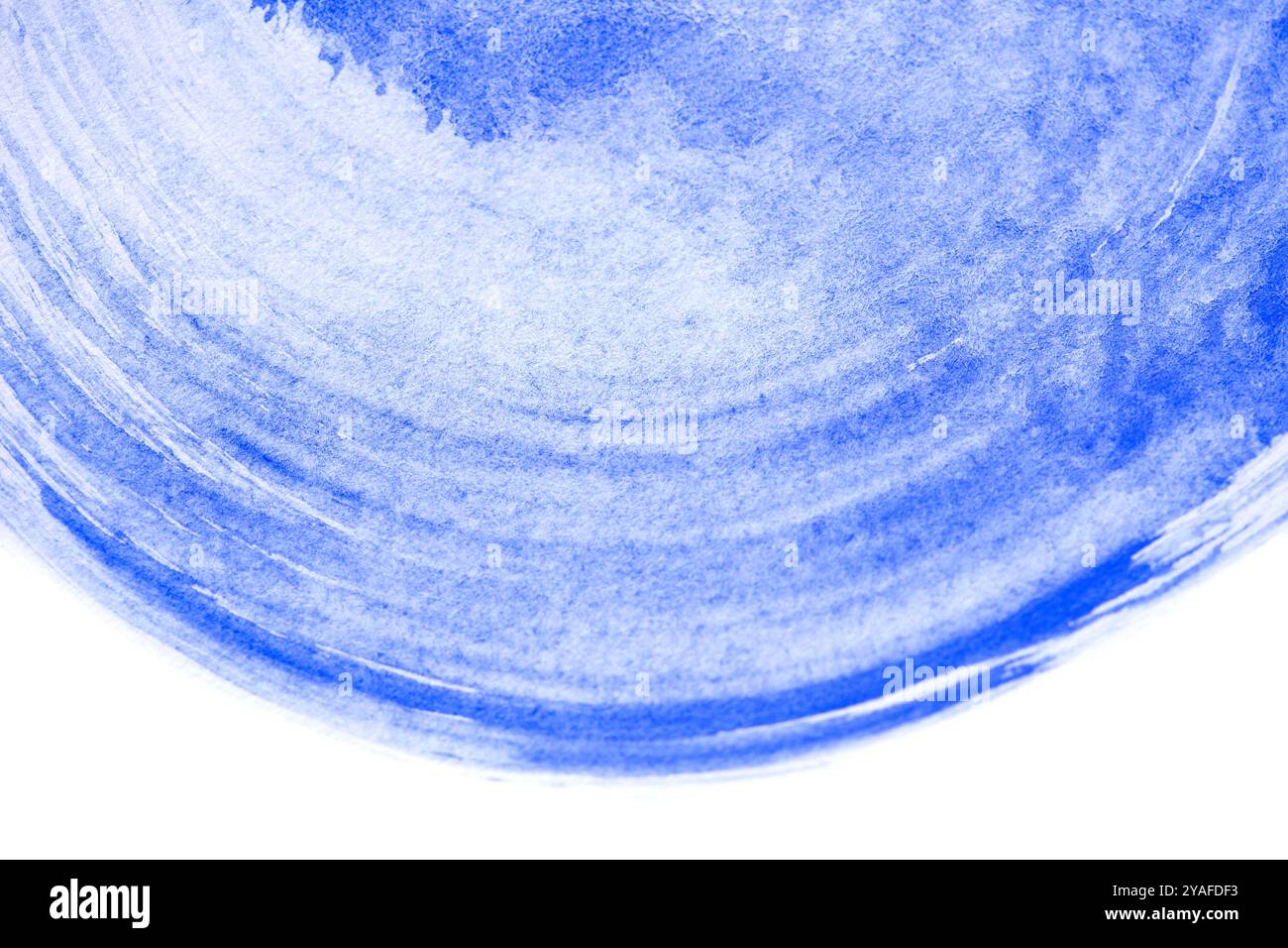 Blaue Aquarellfarbe auf weißem Papier Stockfoto