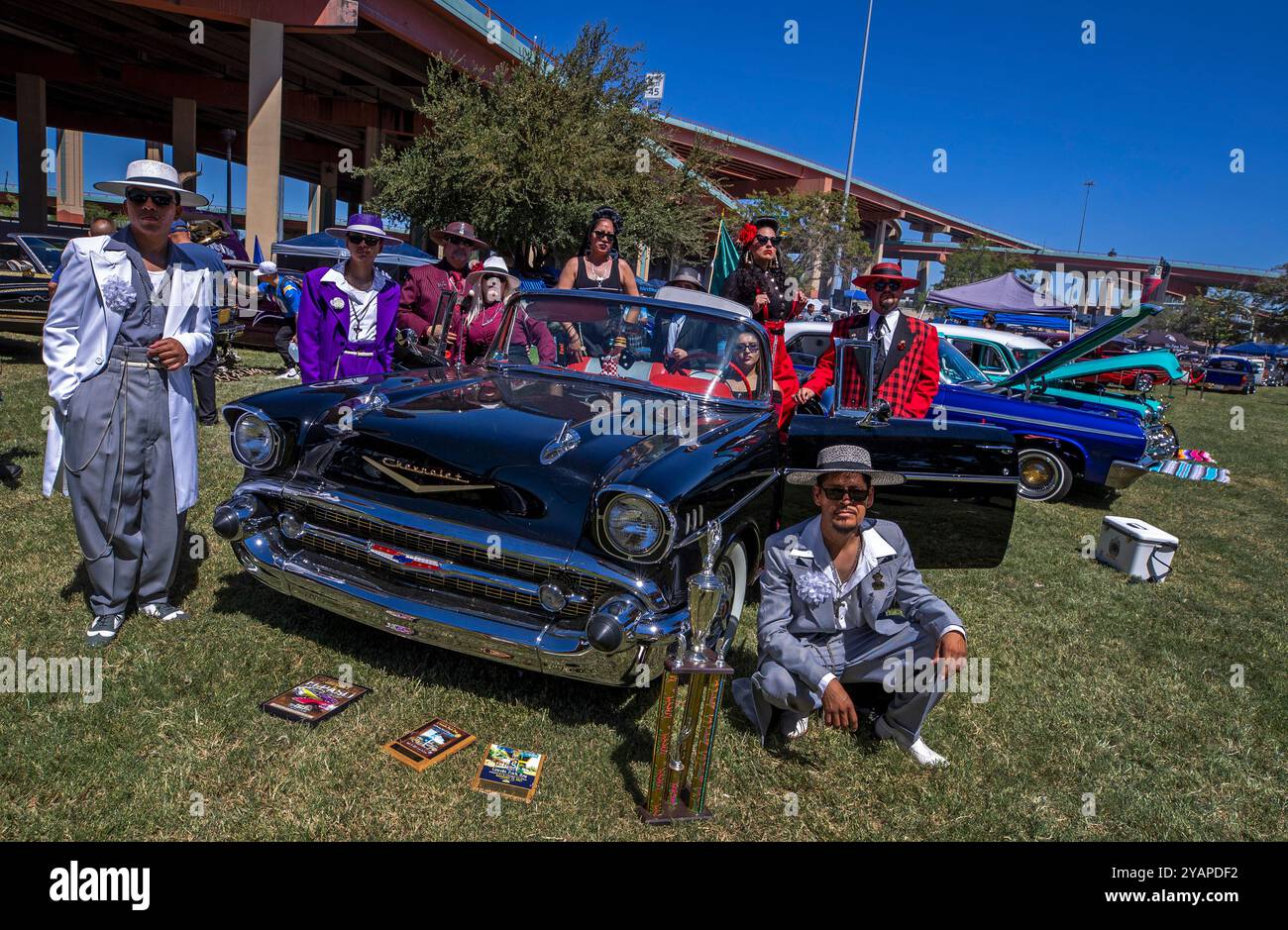 Attendees of a lowrider exhibition, wearing Zoot suits of the Mexican ...