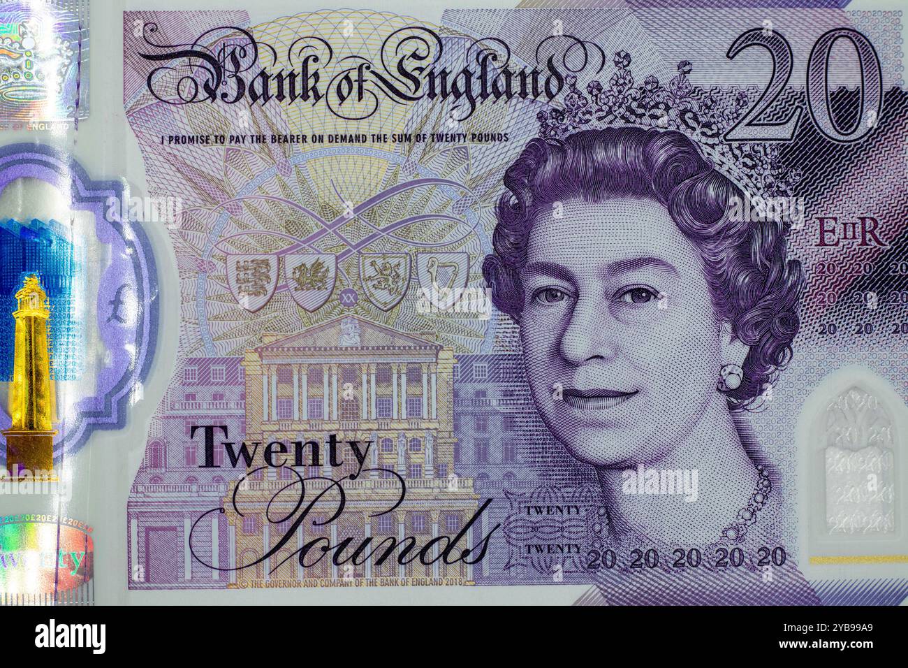 Eine Nahansicht einer 20-Pfund-Banknote der Bank of England mit einem Porträt von Königin Elizabeth II. Die Banknote enthält komplizierte Designs und Sicherheitsmerkmale Stockfoto