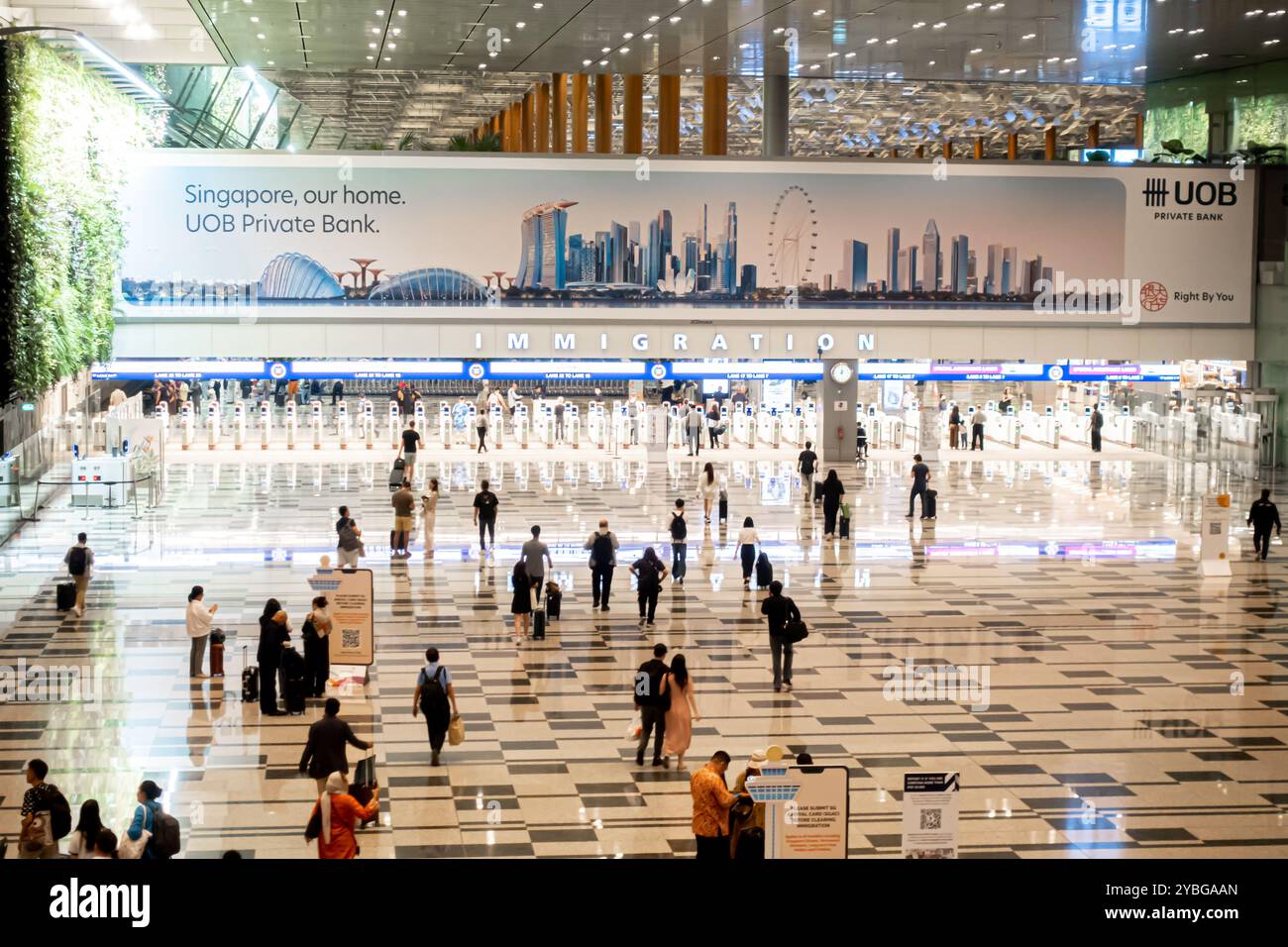 Einwanderungsschalter am Terminal 3 des Flughafens Singapur Stockfoto