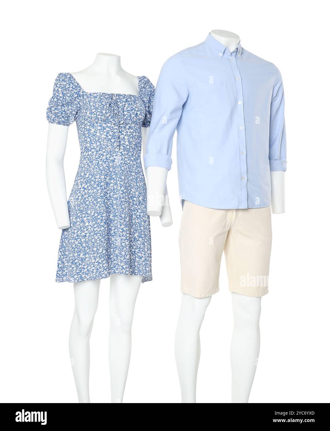 Weibliche und männliche Schaufensterpuppen mit stilvollen Outfits isoliert auf weiß Stockfoto