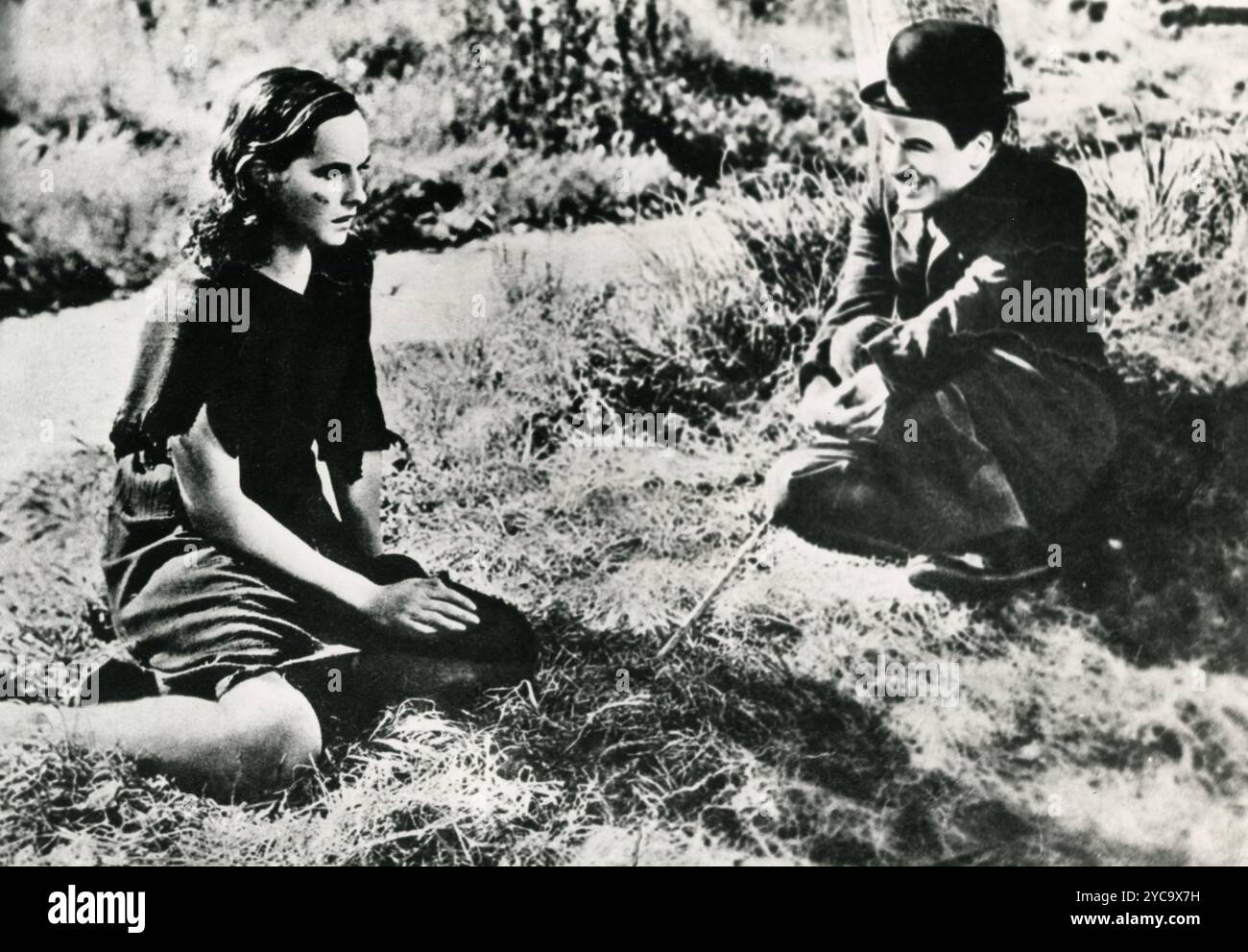 Der britische Schauspieler Charlie Chaplin und die Schauspielerin Paulette Goddard im Film Modern Times, 1936 Stockfoto