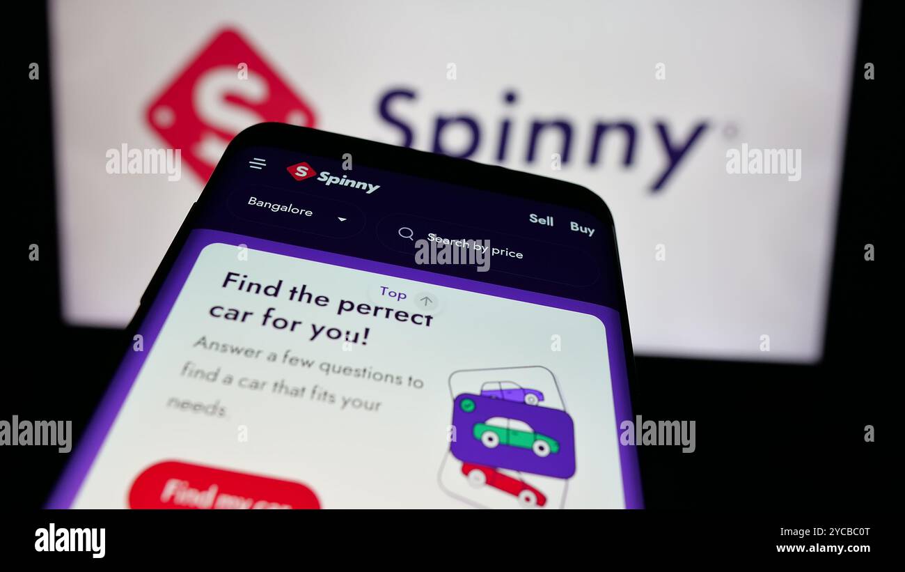 Smartphone mit Website von Valuedrive Technologies Pvt. Ltd. (Spinny) auf dem Bildschirm vor dem Firmenlogo. Fokussieren Sie sich oben links auf der Telefonanzeige. Stockfoto