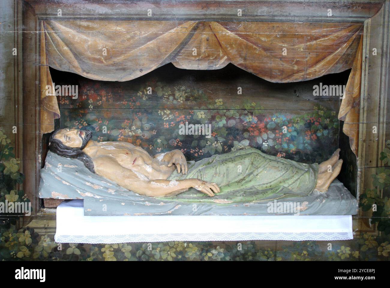 Jesus wird in das Grab gelegt. Stockfoto