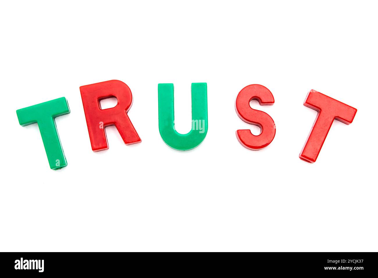 Magnet Alphabet TRUST Stockfoto