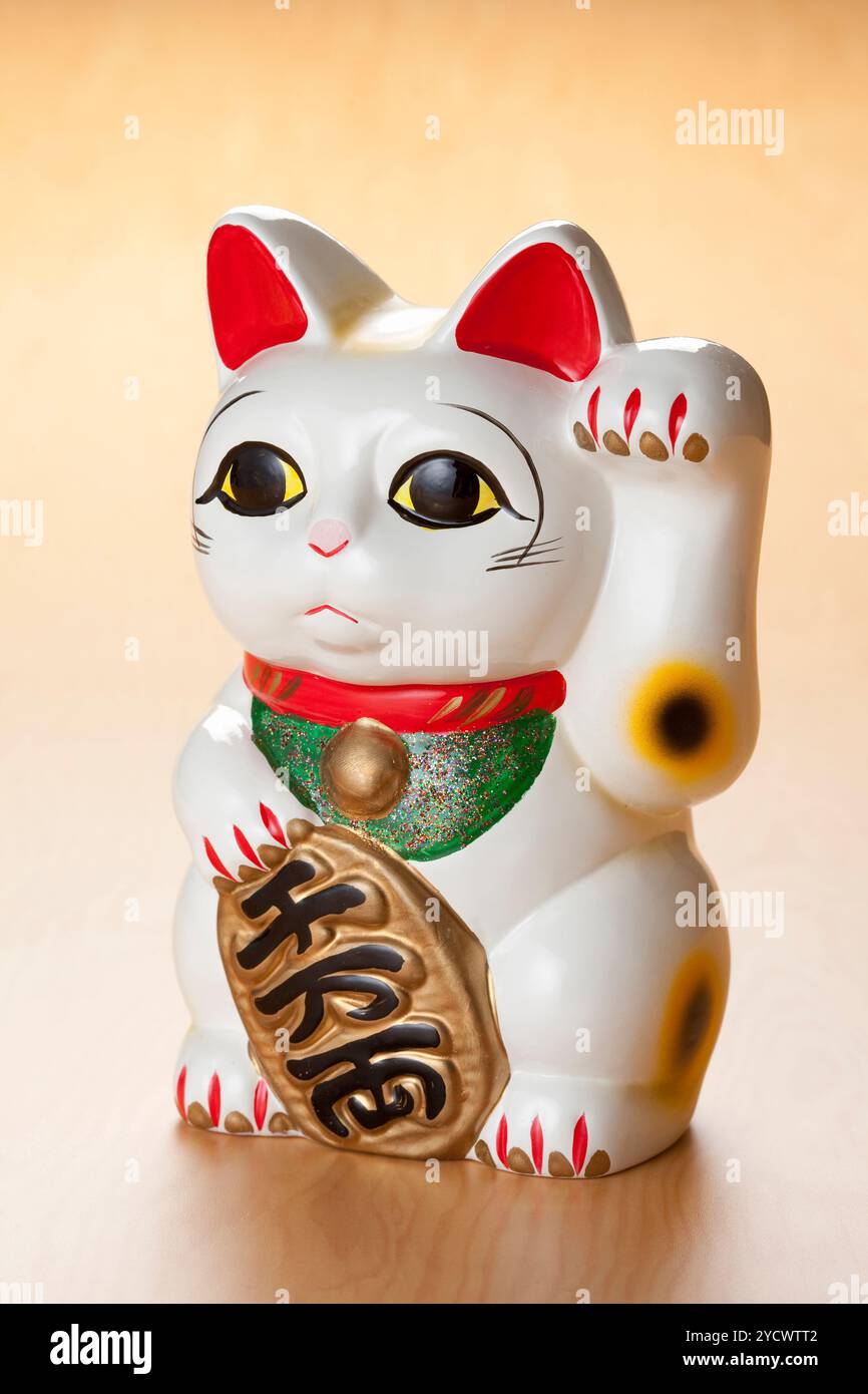 Maneki neko (anwinkende Katze) Stockfoto
