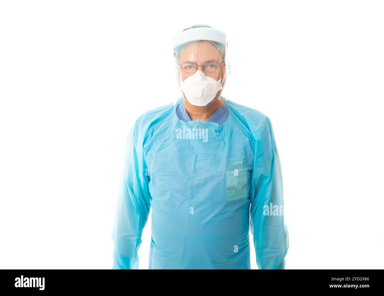Männlicher medizinischer Mitarbeiter in schützender PSA Stockfoto