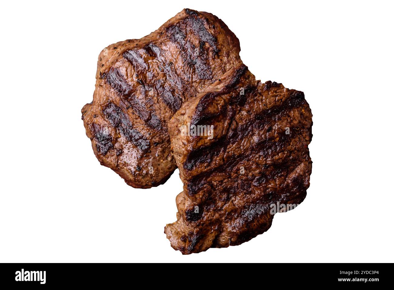 Frisches saftiges, köstliches Rindfleisch auf dunklem Hintergrund Stockfoto