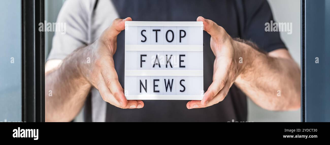 Fake-News-Infodemien während COVID-19-Pandemien Stockfoto