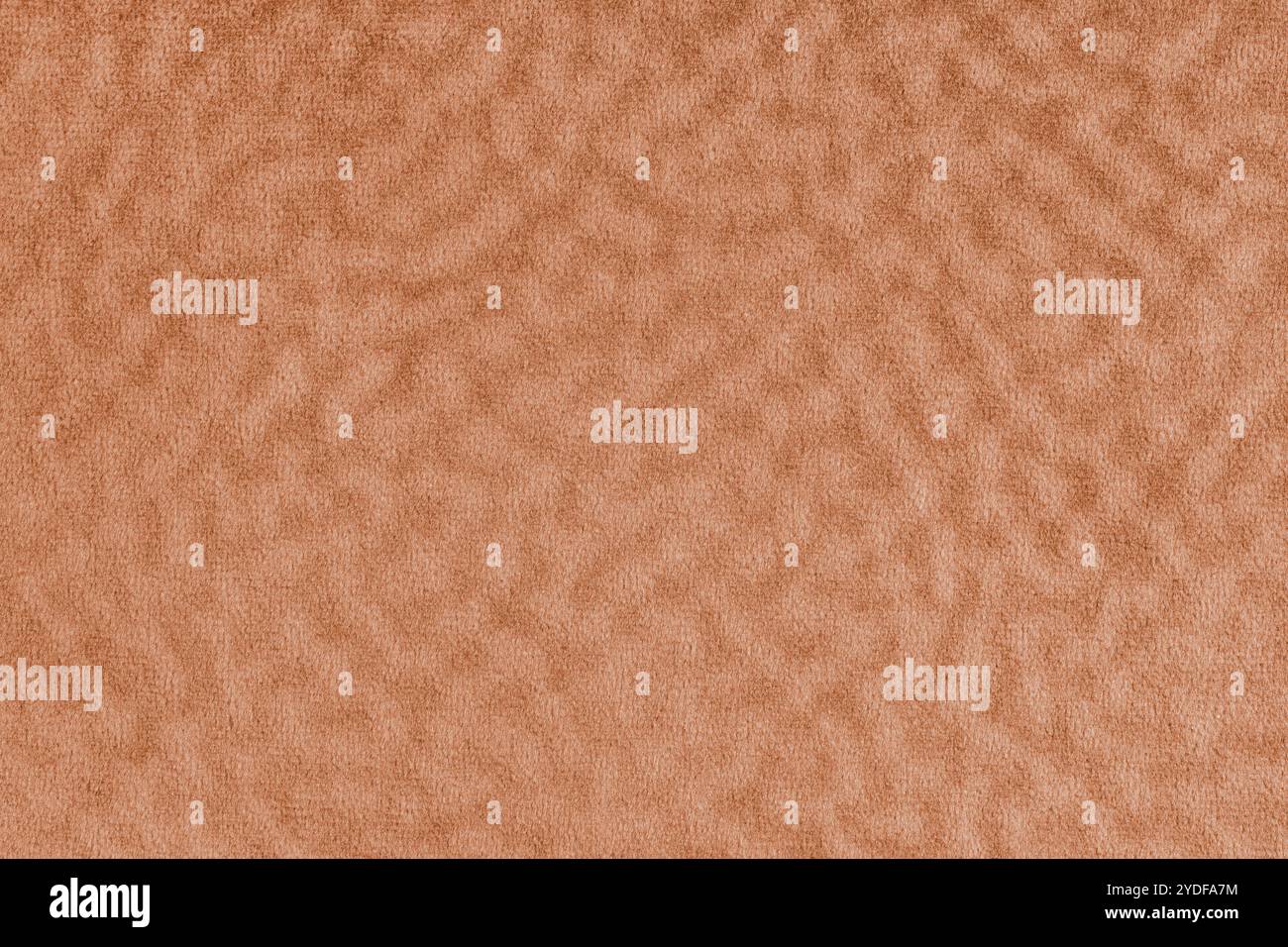 Kunstfell, Veloursstoff in Orange oder Tuch mit Welleneffekt. Die flauschige Gewebeschicht aus Kunstpelztextilien. Hintergrund der Arbeitsfläche. Dekorativ fabelhaft Stockfoto