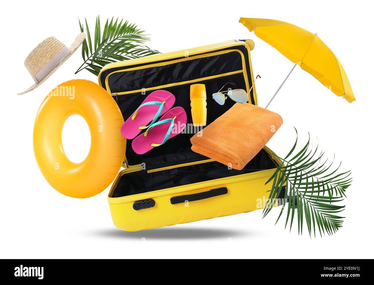 Koffer und Strandgegenstände in der Luft auf weißem Hintergrund. Bereit für die Reise Stockfoto