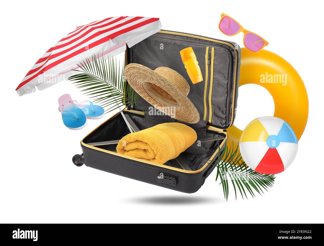 Koffer und Strandgegenstände in der Luft auf weißem Hintergrund. Bereit für die Reise Stockfoto