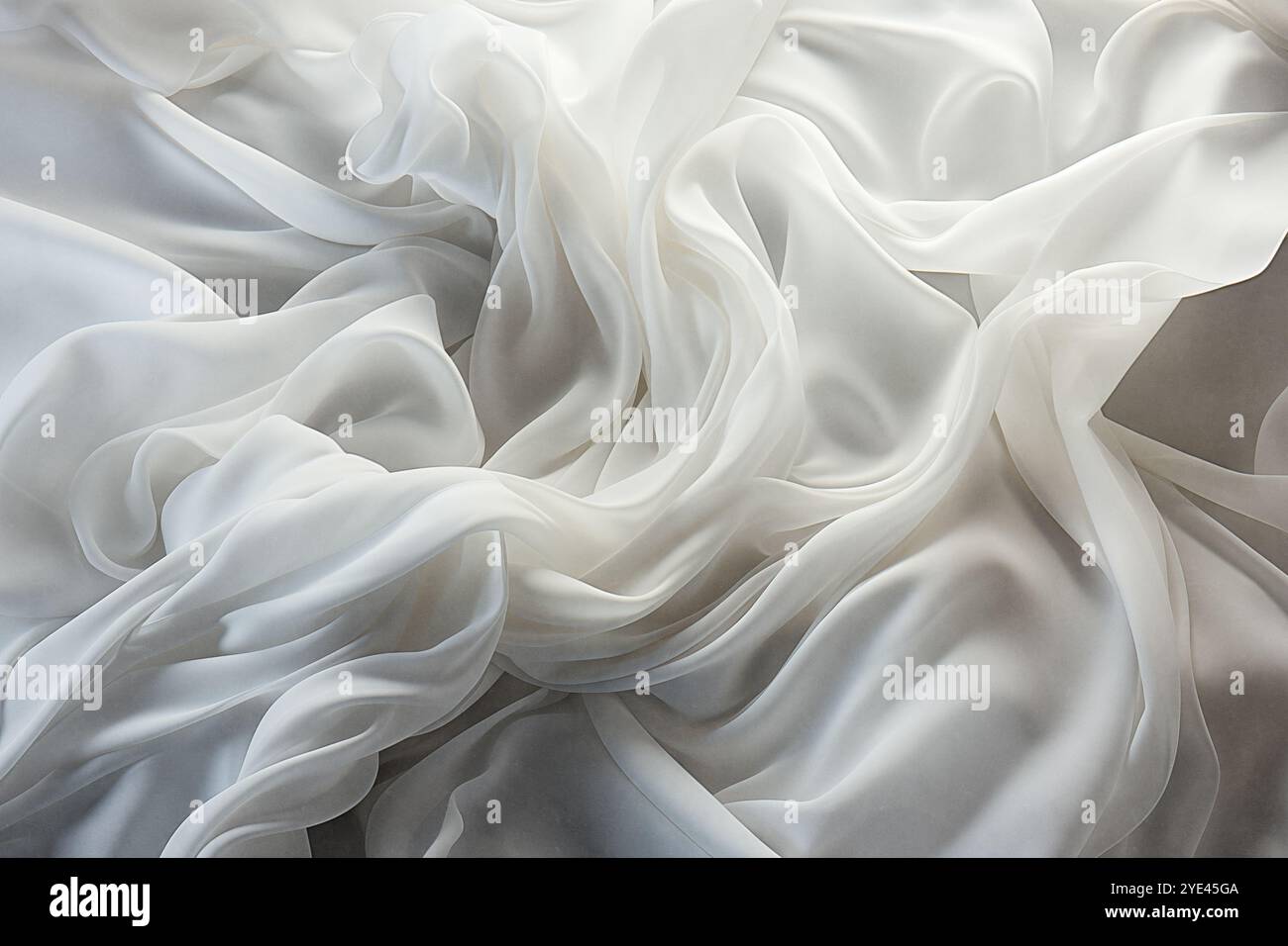 chiffon, durchscheinendes Material. Draufsicht. Falten aus leichtem Material. Hochzeit Hintergrund. Weißer luxuriöser Hintergrund, der Stoff liegt in weichen Wellen. Stockfoto