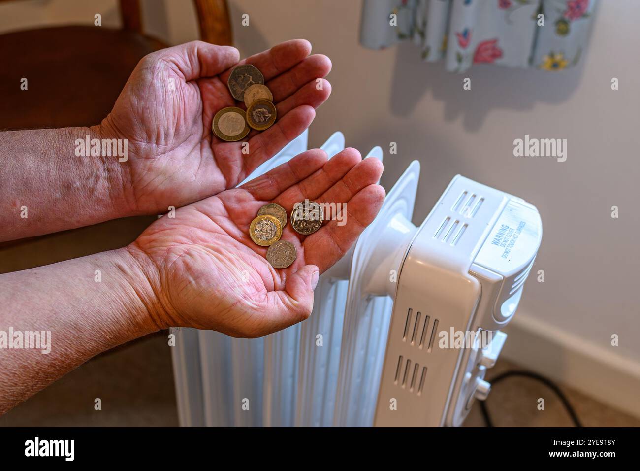 Steigende Energiekosten und staatliche Kürzungen Stockfoto
