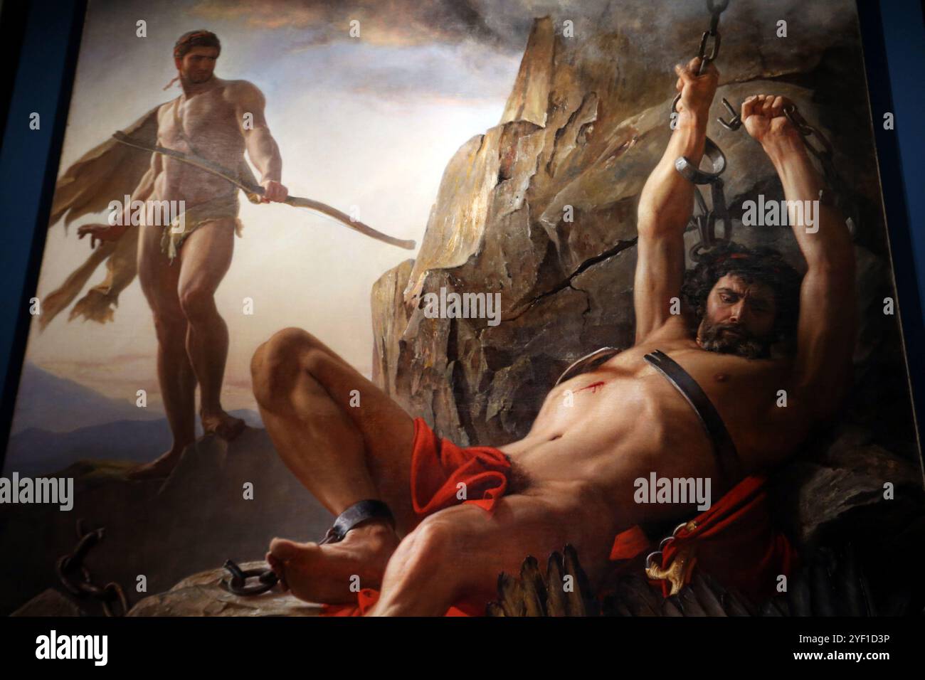 Das griechische Kulturministerium präsentierte erstmals dem griechischen Publikum das Gemälde „Prometheus Unbound“ aus der Tatoi Estate Collection im Museum Canellopoulos. Das monumentale Werk (3,98 Χ 2,77 m) gilt als Meisterwerk des dänischen Künstlers Carl Bloch und wurde 1864 für den jungen König Georg I. gefertigt, der es bei seiner Ernennung zum griechischen Thron (1863) in Auftrag gab. Es zeigt Prometheus, der sich von den Ketten befreit, die ihm von Zeus auferlegt wurden, während Herkules gerade den Adler getötet hat, der täglich die Leber des Titanen verschlang. Es ist ein allegorisches Werk aus der Zeit der Roma Stockfoto