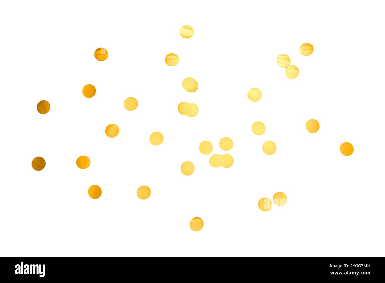 Goldenes, glitzerndes Konfetti auf einem schlichten Hintergrund für eine festliche und lebhafte Atmosphäre Stockfoto