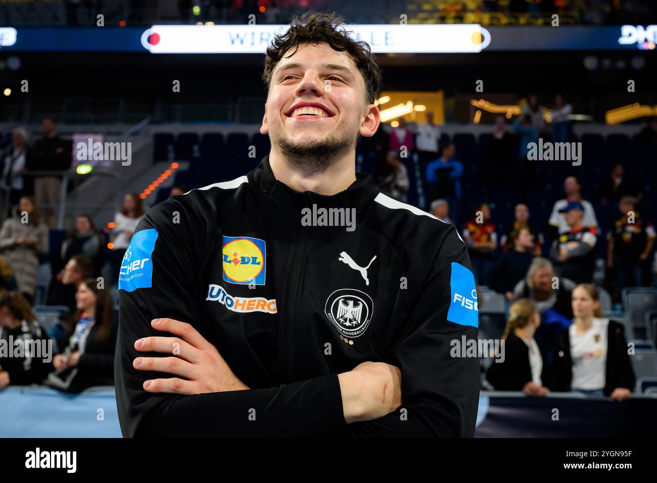 Mannheim, Deutschland. November 2024. Handball: Qualifikation zur Europameisterschaft, Deutschland - Schweiz, 2. Qualifikationsrunde, Gruppe 7, Spieltag 1, Marko Grgic aus Deutschland) lachend. Quelle: Marco Wolf/dpa/Alamy Live News Stockfoto