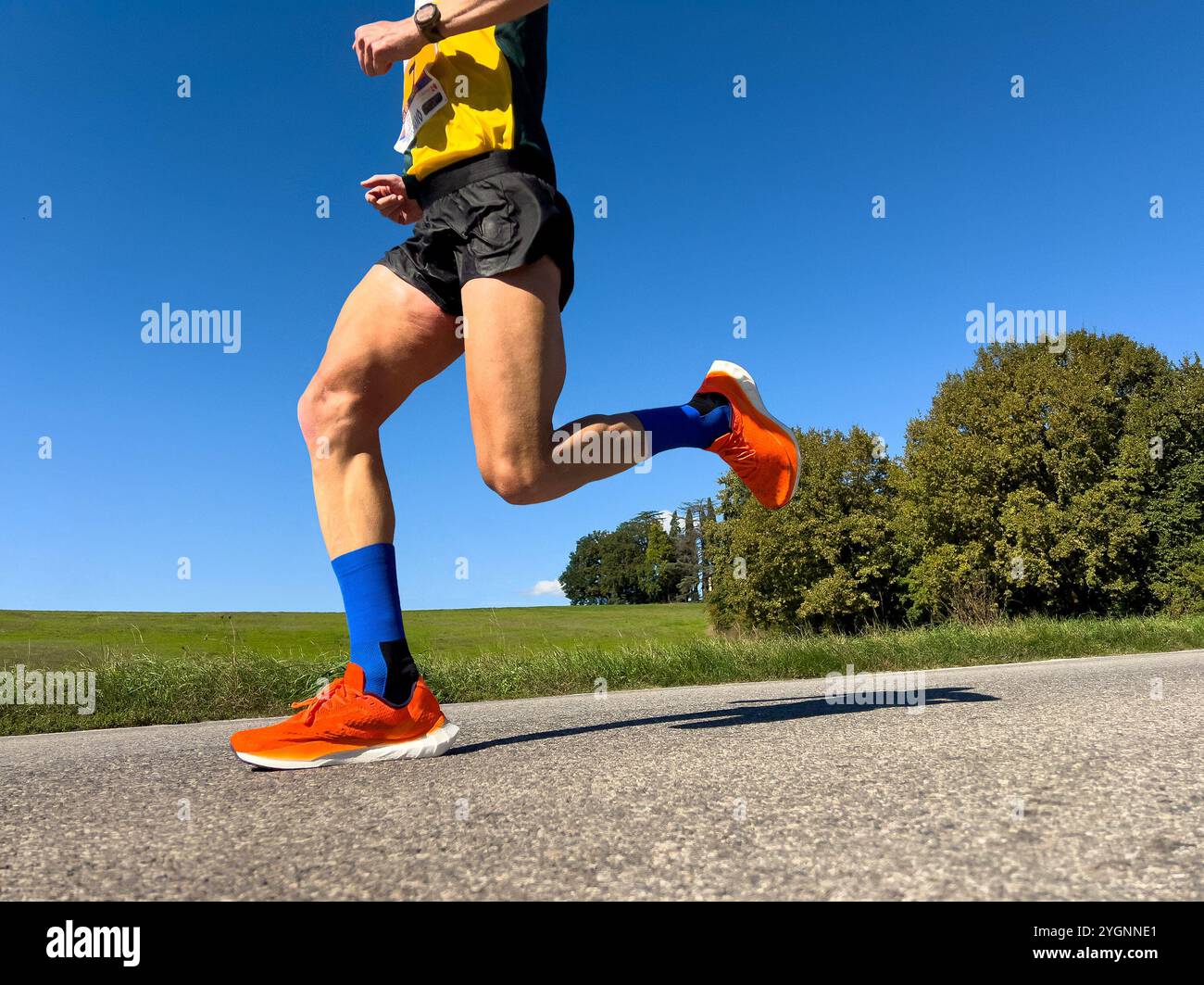 Legs Läufer laufen Marathonrennen in Italien Stockfoto