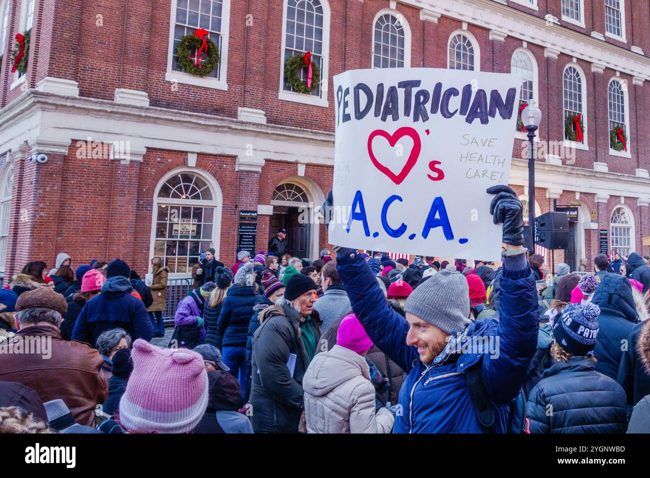 Boston, MA, USA, 15. Januar 2017. Demonstrant mit Schildervorschrift Rettet das ACA-das Affordable Care Act, bekannt als Obamacare. Stockfoto