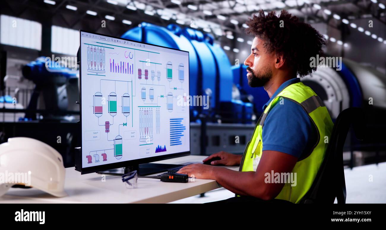 Afroamerikaner, Der Heizungsrohre In Der Gasanlage Kontrolliert Stockfoto