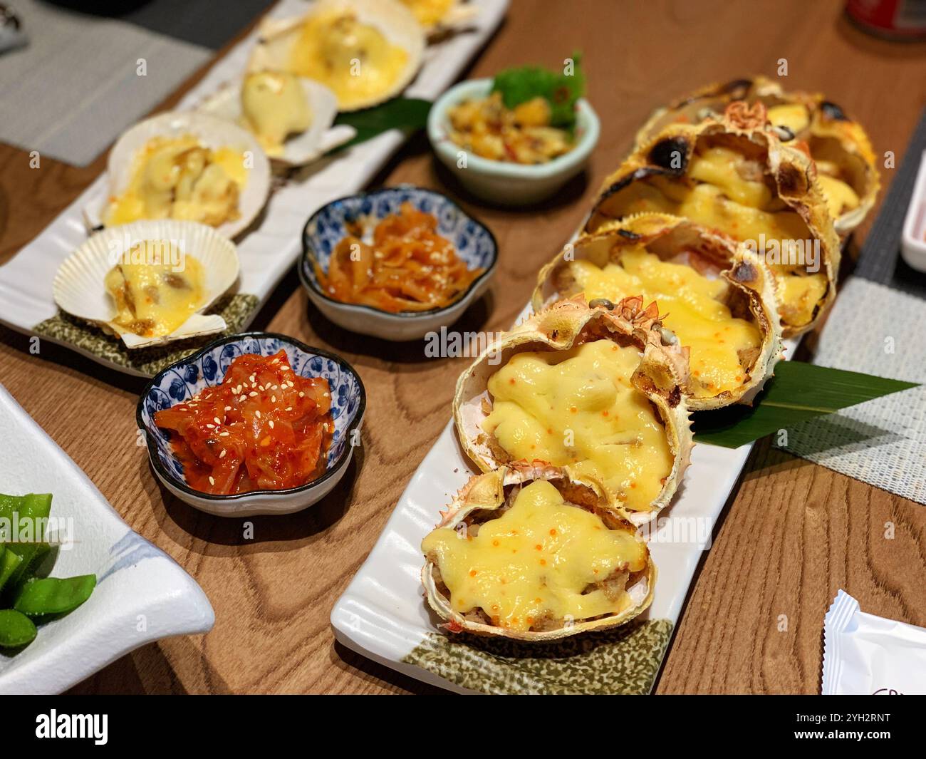 Gourmet gebackene Muscheln und Beilagen in Peking Stockfoto