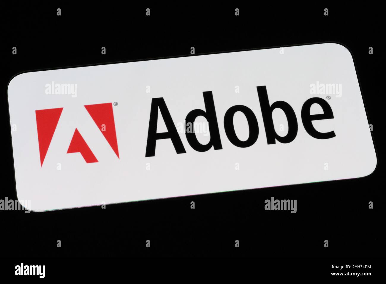 Logo der Adobe-Firmenmarke auf dem Telefonbildschirm Stockfoto