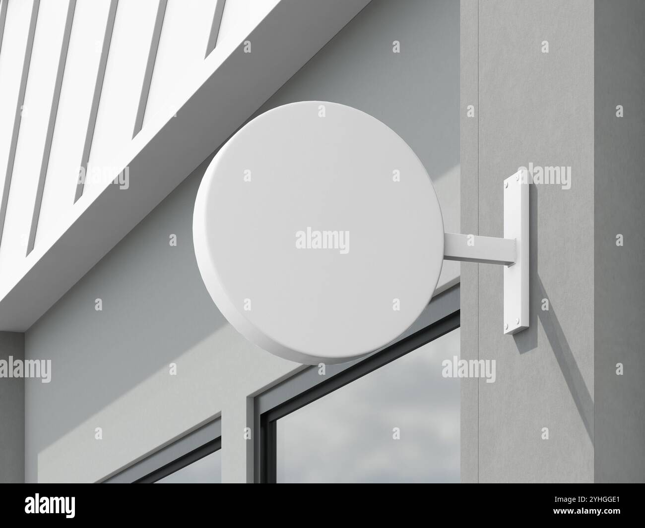 Weißes leeres rundes Metallwandschild mit realistischem Gebäude Stockfoto
