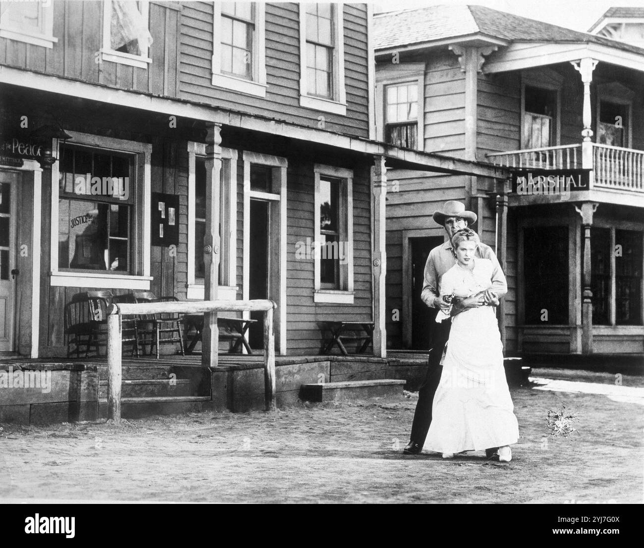 ESCENA DE LA PELICULA 'SOLO ANTE EL PELIGRO' - 1952 - GARY COOPER / IAN MACDONALD / GRACE KELLY. Autor: FRED ZINNEMANN. Stockfoto