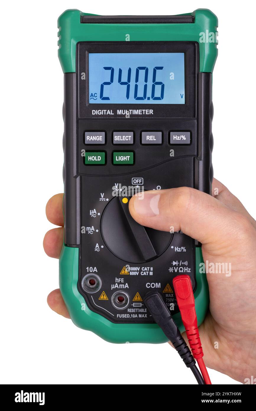 Grünes Digitalmultimeter Mit Handgriff, Das Spannung Anzeigt Stockfoto