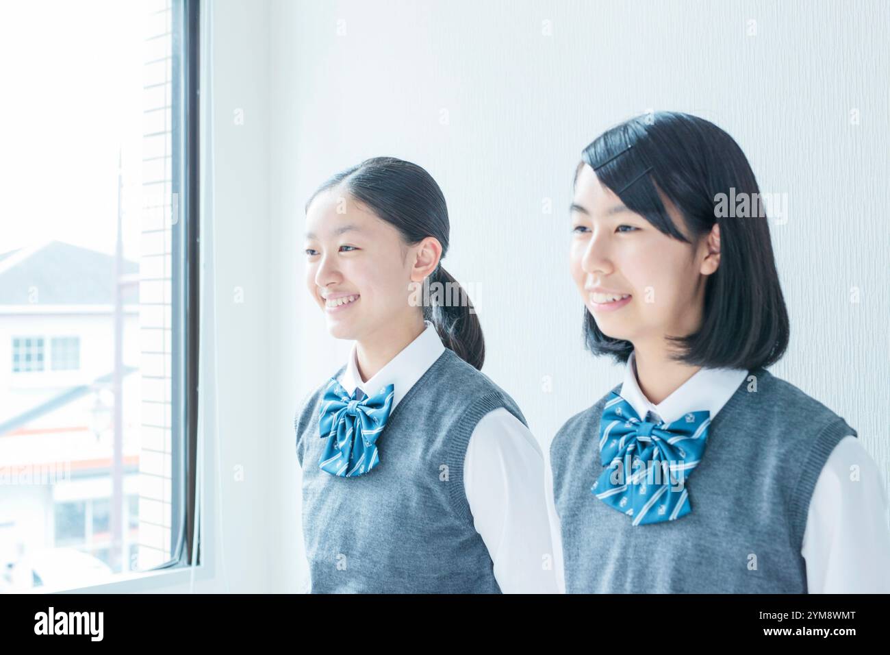 Lächelnde Schulmädchen Stockfoto