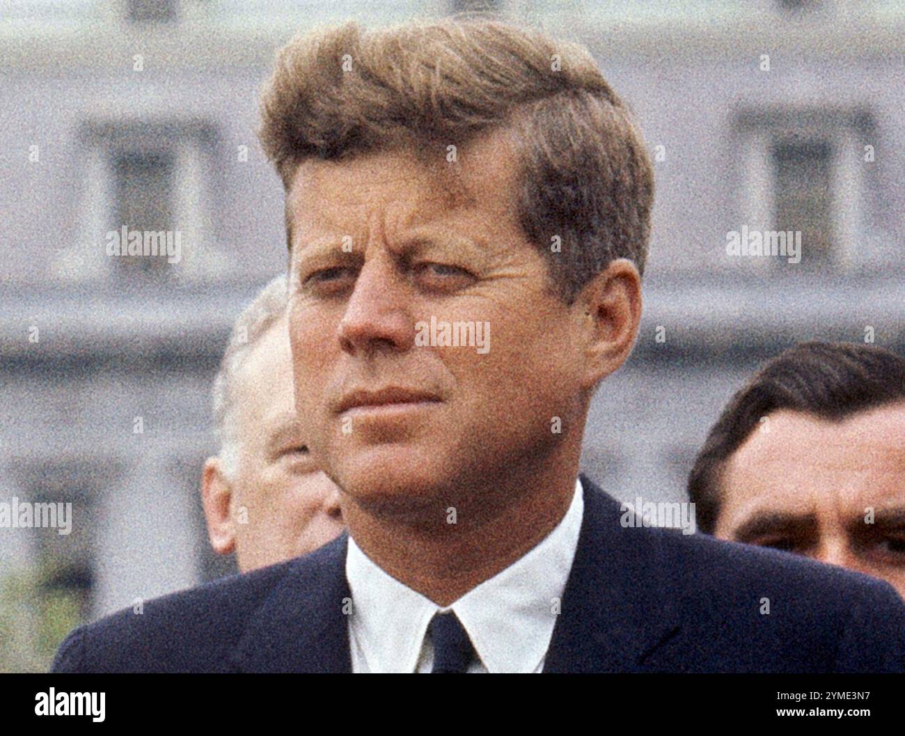 FILE - President John F. Kennedy listens while Grand Duchess Charlotte of Luxembourg speaks outside the White House, April 30, 1963, in Washington. (AP Photo/William J. Smith, File) Stockfoto